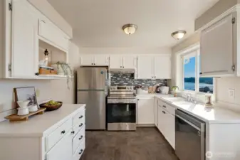 Refreshed cabinets for plenty of storage.