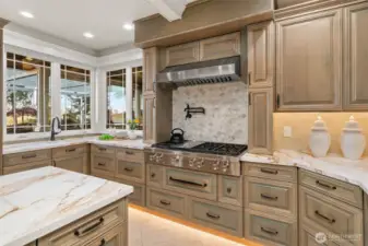 A pot filler, food warmer and a separate prep sink make cooking easy.