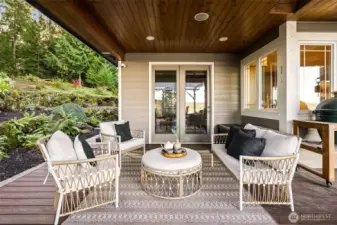 Plumbed for natural gas, the outdoor covered area is ready for your dream outdoor kitchen.