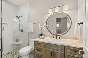 A curbless shower in the mother-in-law suite bathroom.