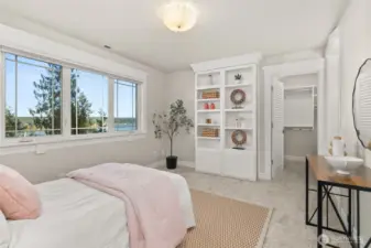 One of three secondary bedrooms in the main residence.
