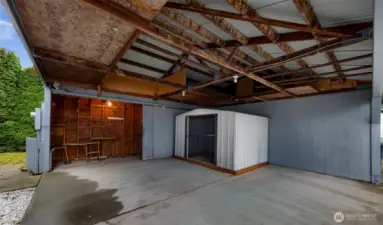 Barn door slides open wide for a work space - Got projects to work on or He/She shed ideas?