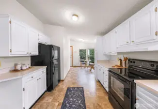 Opposite view of the long spacious kitchen.