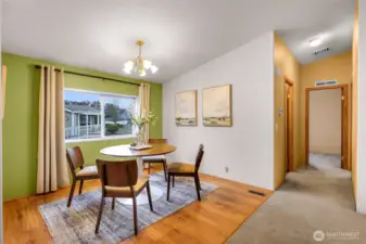View from the dining area looks out towards the other park owners and the hallway to your right, has the full bathroom and 2 bedrooms on the North side of the home.