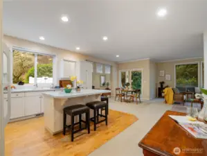 The open floor plan invites your guests to mingle and entertain the cook.