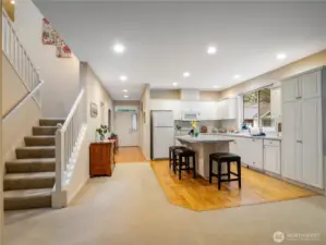 The kitchen has great workspace and white cabinets.