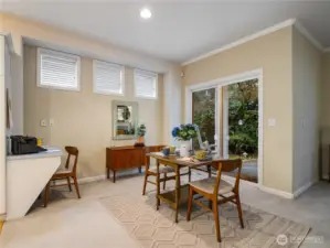 Whether you are paying bills, catching up on correspondence, or eating a nice meal; this living room space can accommodate your needs.