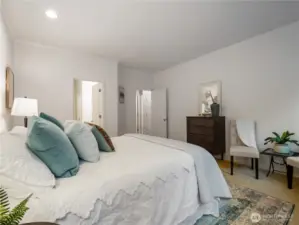 New paint brightens this primary bedroom.