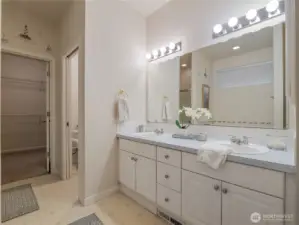 The primary suite on the main floor has double sinks and you have easy access to the large walk-in Closet.