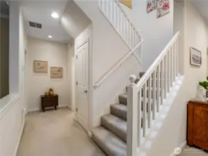 The hallway between the living area and the primary suite.