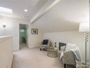 The area above the stairs have a nice niche that can be used for a second living room or maybe an office.