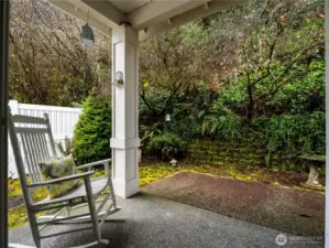 The back tard patio is a cool place to relax on hot summers days.