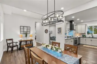Dining Room is adjacent to the Oversized Kitchen. You could definitely fit a larger table here!