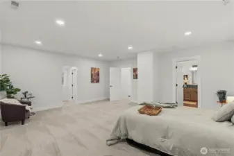 Primary Bedroom showing the Closet Hallway to the Left and En Suite Bath to the Right.