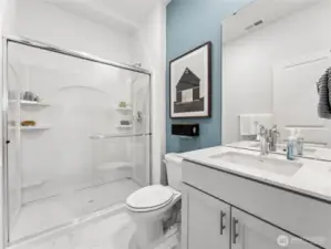 Bath with walk-in shower downstairs. Pictures are for representational purposes only, colors and features may vary.