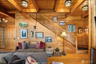 GORGEOUS T&G CEDAR PANELING AND SOLID DOUGLAS FIR CEILING BEAMS FRAME THE RUSTIC STAIRCASE