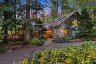 SEPARATE GUEST/ BUNKHOUSE AND GYMNASIUM WITH 1/2 COURT WOOD FLOOR BASKETBALL COURT AND HALF BATH