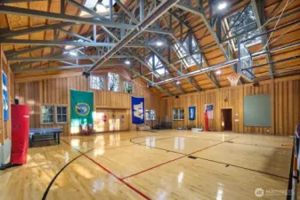 AWESOME SPACIOUS GYMNASIUM W/HUGE SKYLIGHTS ADDS TO THE BEAUTY OF THIS SPORT COURT WHICH HAS MULTIPLE USES FOR RECREATION. ALSO USED AS AN ART AND YOGA STUDIO AT TIMES