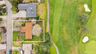 13,500 square foot level lot, with an evenly spaced yard in both the front and back.