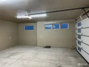 Fully-finished primary Garage.