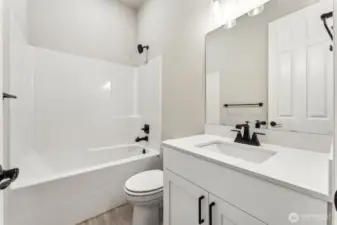 Photos are of a similar home with same floorplan.