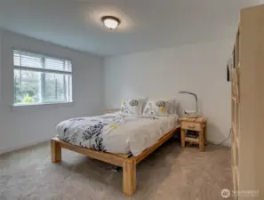 Large primary bedroom with plenty of space for a king-sized bed plus all your furniture.