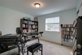 Gogeously sunny second bedroom overlooks the delightful backyard.
