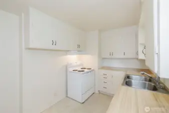 The efficient layout offers ample cabinet storage and workspace
