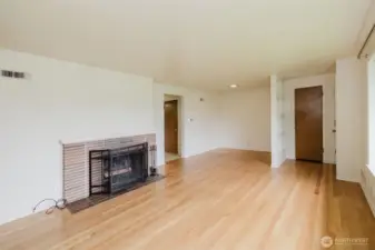 charming brick fireplace adds warmth and character