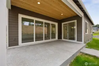 Covered back patio with multi-slide doors