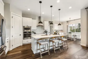 Photos are of the Darius Model Home on Lot 2