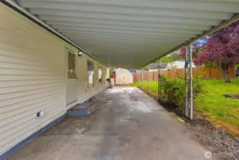 Large carport w/ room for 2 cars
