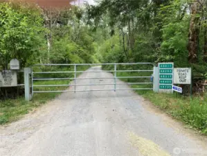 in 1.4 miles you come to the locked gate. The keybox with the code in it is on the right side of the gate. The mailbox with the keypad is on the left side of the gate. Please lock the card with the code on it back in the keybox and close it.