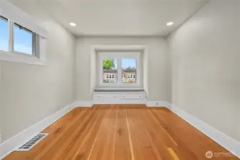 Guest bedroom - main floor with original window bench.