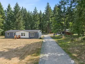 RV spots to right of home coming in.