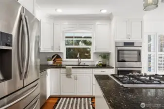 With a beautiful view out the kitchen window, abundant storage, and stainless appliances - this kitchen is truly the heart of the home, and will be a space to gather & create memories for years to come.