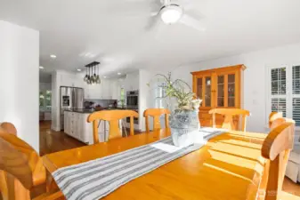 View from the dining room into the kitchen, dappled sunlight fills this space making it the perfect location to enjoy your morning coffee or evening beverage.