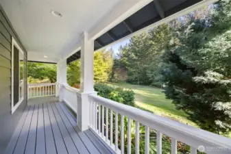 The covered wrap-around porch is the space of dreams, offering covered lookout onto your gorgeous property. The leaves are just beginning to change, offering an ever changing visual landscape.
