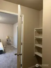 pimary walk in closet shelving