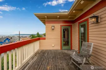 Deck off the primary suite with sweeping views of the Puget Sound and Olympic Mountains — your own peaceful retreat.