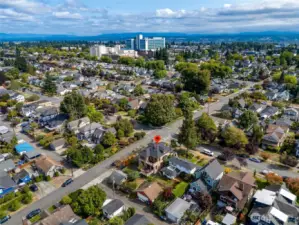 Aerial view highlighting the home's convenient proximity to Providence Hospital, Downtown Everett, and the surrounding tree-lined North Everett neighborhood.