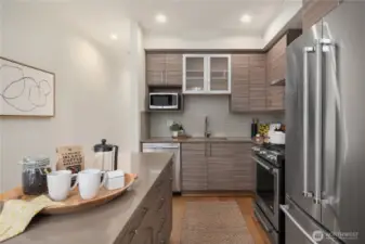 Looking across the island you get a great sense of all counter space and the storage in the full height cabinets.