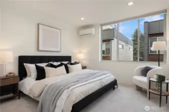 The primary easily handles a king sized bed and has an overhead mini-split providing A/C.