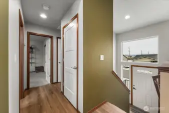 Coat closet in hallway.