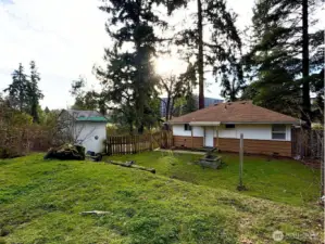 Spacious backyard perfect for entertaining, pets, or gardening