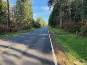 Twin Spits Road is pretty quiet, looking east towards Hansville.