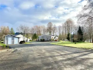 109 Obsidian Dr in Ariel Washington is an updated kitchen, flooring in this 3 bedrooms, 2 full bathrooms on 2 flat acres that is move-in ready. 3 outbuildings, fenced garden with garden boxes, plenty of parking outside and in the shop.