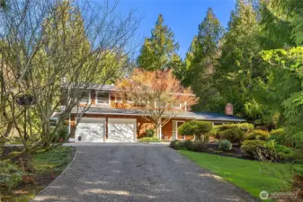 This property offers exceptional privacy and curb appeal.