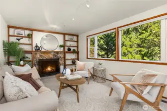 The Den offers a wood-burning fireplace with bookshelves surround.