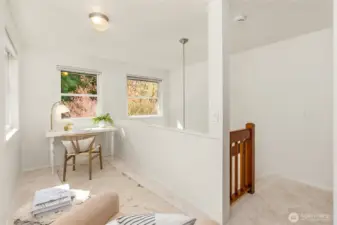 cozy reading nook at the top of the stairs.